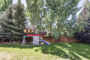 View of yard featuring a playground