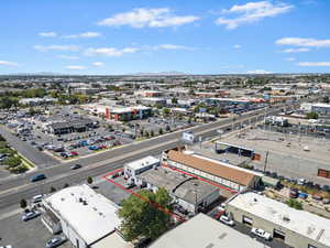 Aerial overview of property's location featuring a mountain backdrop and property boundaries highlighted