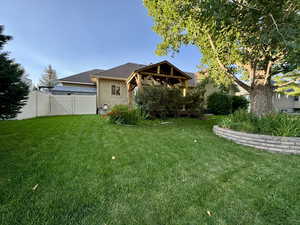 View of yard with a gate