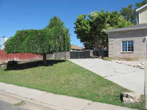 View of yard with a gate