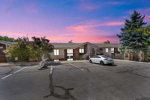 View of front of property featuring uncovered parking