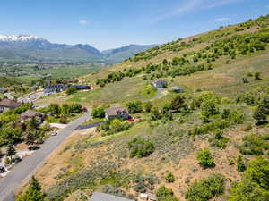 Overview of rural landscape featuring a mountain backdrop
