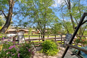 Wooden deck with a residential view