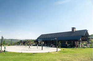 Surrounding community featuring a yard and a patio