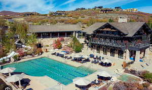 Community pool with a patio area