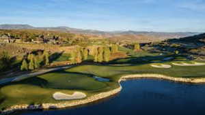 View of property's community featuring view of golf course and a water and mountain view