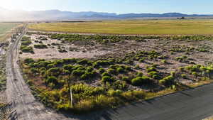 Overview of rural landscape with a mountain backdrop