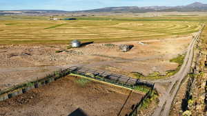 Aerial view of sparsely populated area with a mountainous background