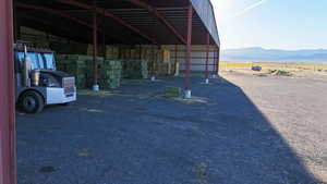 View of car parking featuring a mountain view