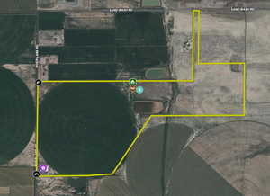 Aerial overview of property's location with property parcel outlined