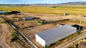 Overview of rural landscape with a mountain backdrop