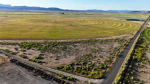 Overview of rural landscape with a mountainous background