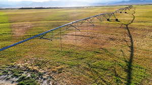Aerial view of sparsely populated area with a mountainous background