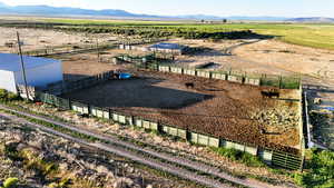 Aerial view of sparsely populated area featuring a mountain backdrop