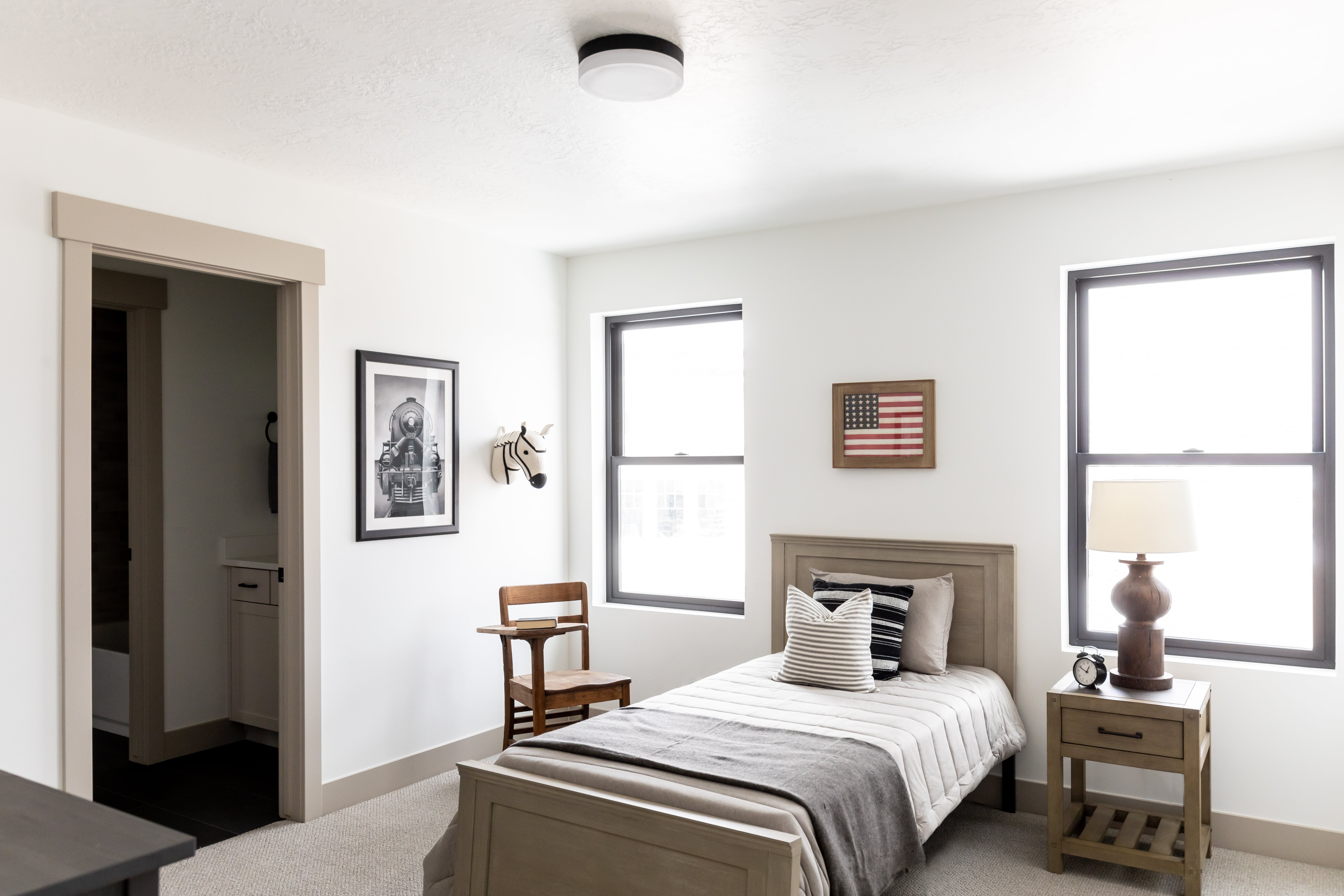 Carpeted bedroom featuring baseboards