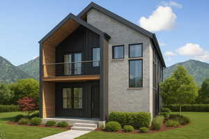 View of front facade with a mountain view, board and batten siding, a front lawn, and a balcony