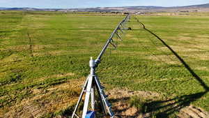 View of property's community with a view of rural / pastoral area and a mountain view