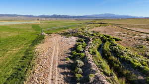 View of rural area with a mountain backdrop