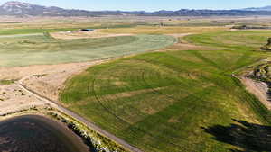 Overview of rural landscape with a mountain backdrop