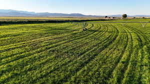 View of mountain backdrop featuring rural landscape and a pastoral area
