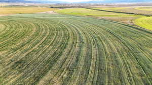 Aerial view of sparsely populated area with a mountainous background