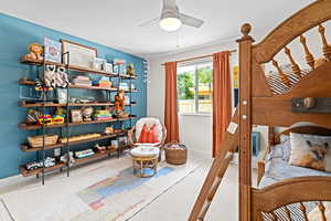 Bedroom featuring carpet flooring and a ceiling fan