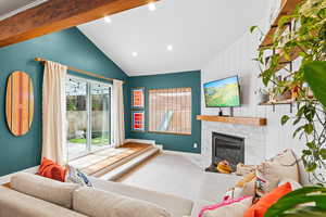 Living room featuring a fireplace and recessed lighting