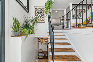 Staircase featuring recessed lighting