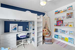 Bedroom featuring a ceiling fan