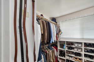 Walk-in spacious closet with window.