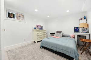 Bedroom with recessed lighting