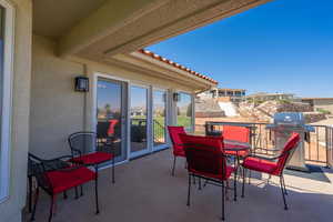 View of patio featuring outdoor dining area