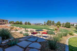View of patio with view of golf course