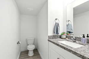 Bathroom with vanity and light
