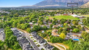 Aerial view of residential area featuring mountains