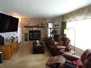 Extra large living room with fireplace.