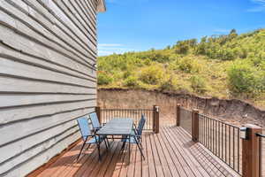 Wooden deck with outdoor dining space