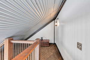 Corridor with dark carpet