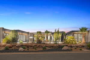 Contemporary home with a garage and stucco siding
