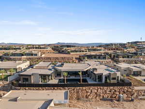 Aerial perspective of suburban area with a mountain backdrop