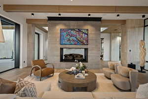 Lobby featuring beam ceiling