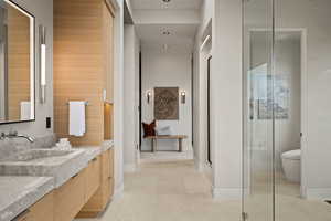 Full bath featuring vanity, light tile patterned floors, a stall shower, and recessed lighting