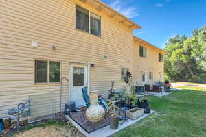 Kitchen door leads to private patio