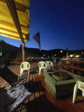 View of deck at night