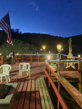 View of deck at night