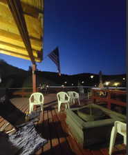 View of deck at night