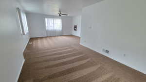 Large bedroom with ceiling fan