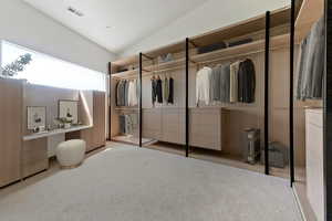 Bedroom featuring a closet and carpet flooring