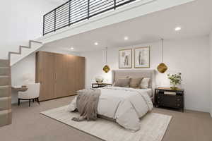 Bedroom with light carpet, recessed lighting, a high ceiling, and a desk