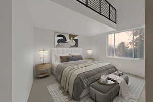Bedroom featuring carpet floors and baseboards